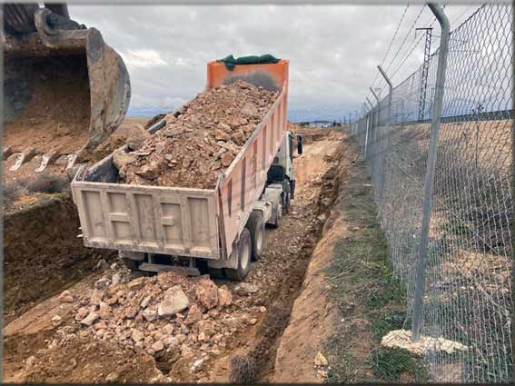 Descarga arido para apisonamiento camino